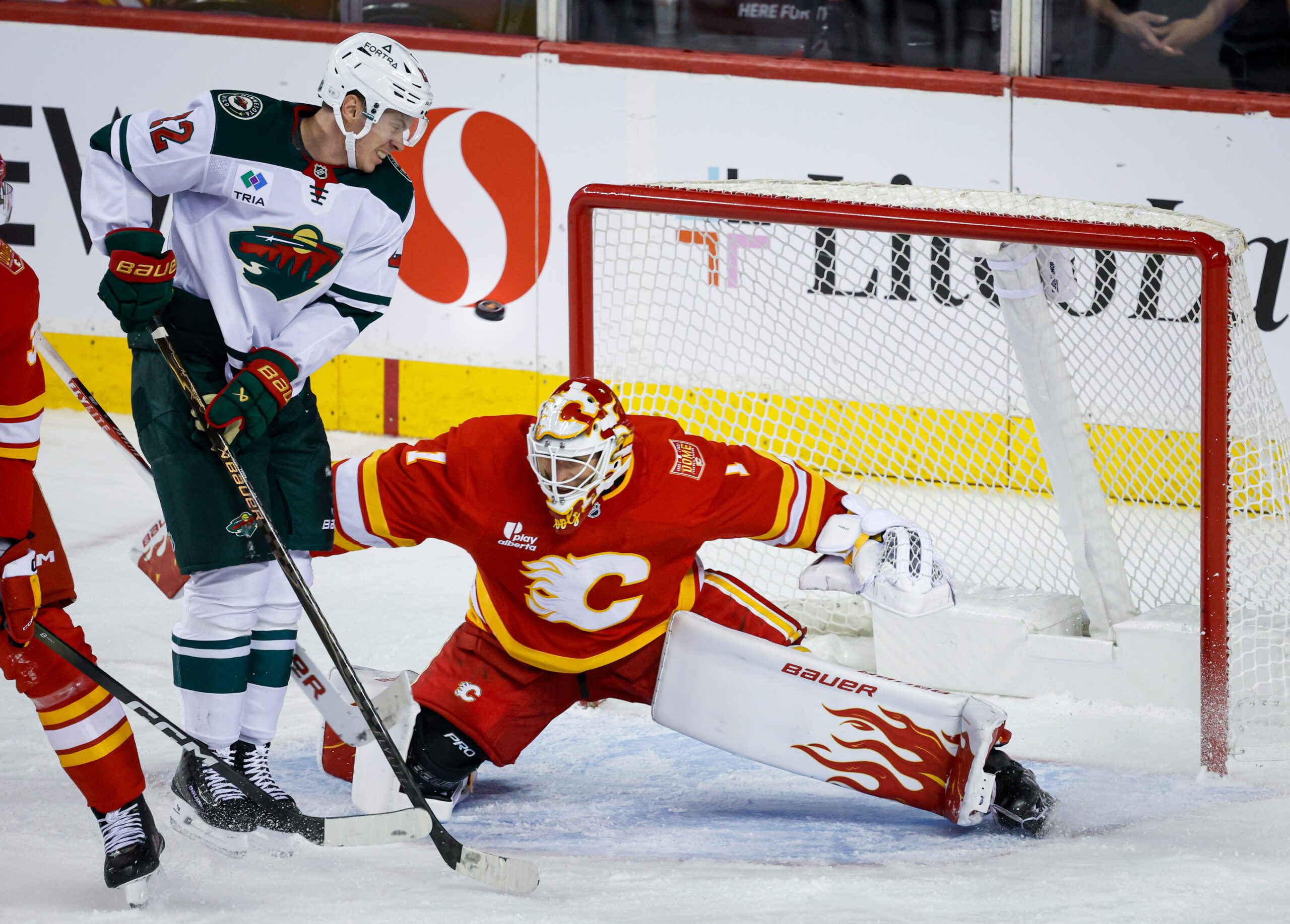 Cooley makes 36 saves in the Flames’ 2-1 victory over the Wild — KSTP 5, Orono Sports news